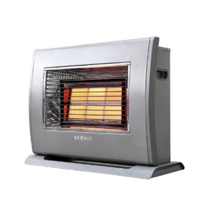 A silver gas heater radiates warmth with an orange glow through a protective grill. It stands on a flat base. The word "BROMIC" is printed on its front.