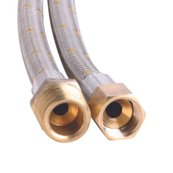 Two flexible metal hoses with brass fittings are positioned side by side, displaying their open ends, in a plain, neutral background.